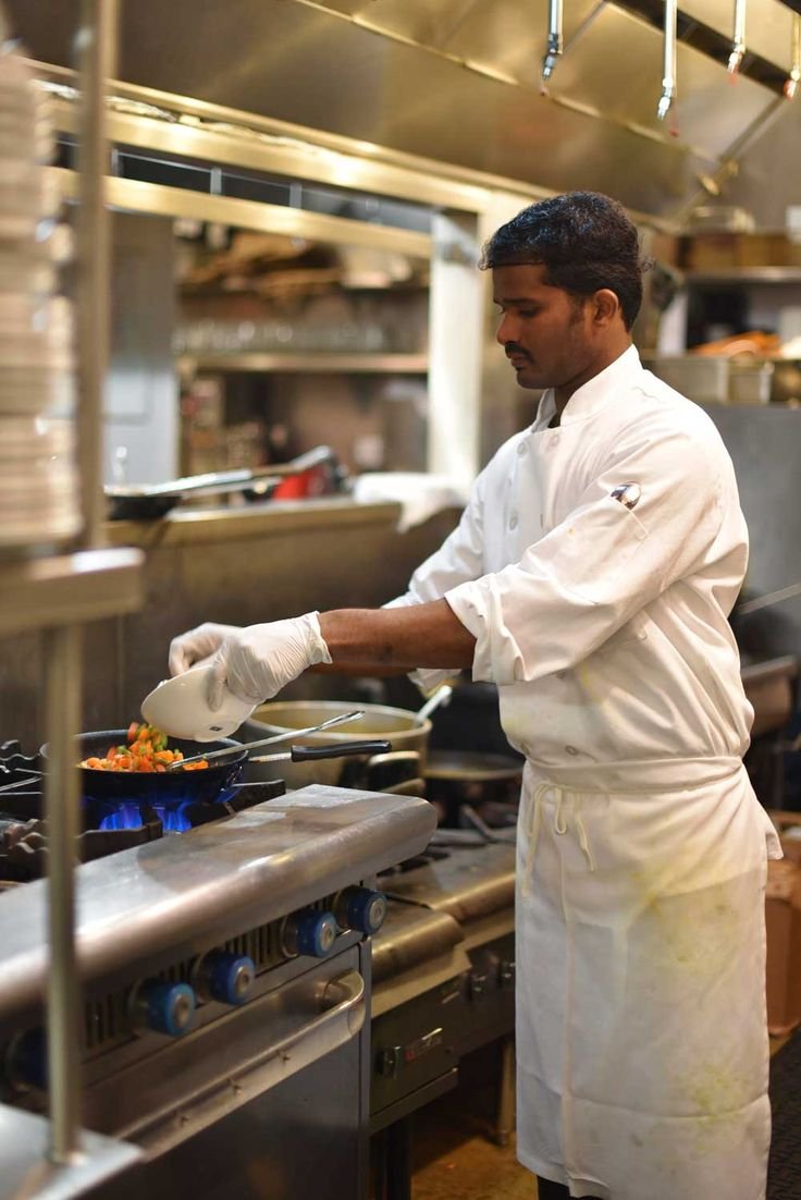 Chef preparing authentic Indian food